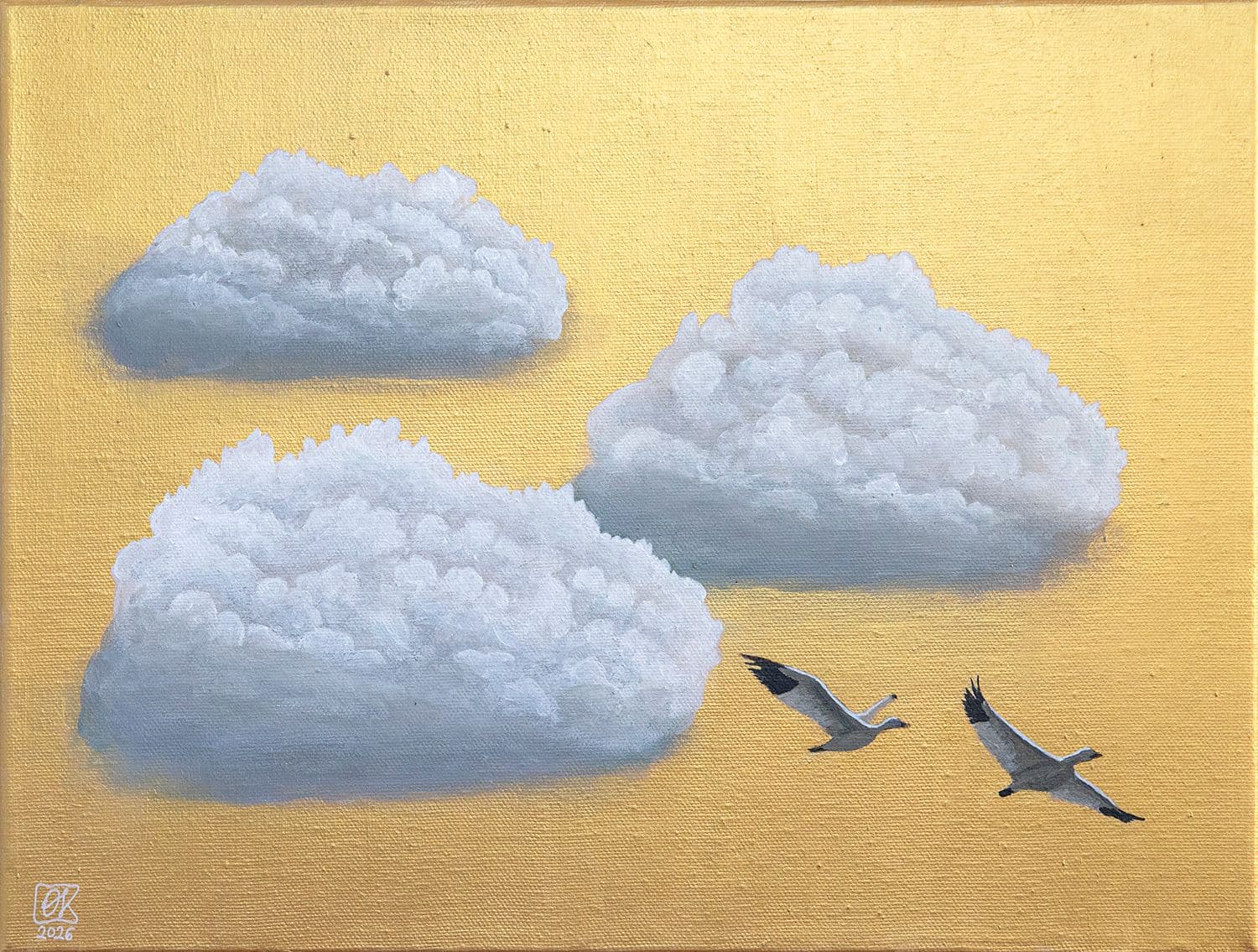 Two geese against a golden sky and clouds.